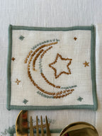 Woven decorative lantern on a bathroom counter with a candle and towel.
ramadan decoration زينة رمضان للبيت
مفرش رمضان - فوط رمضان